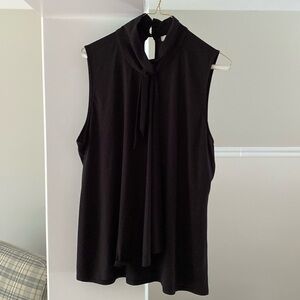 White House Black Market woman’s sleeveless black top size XL